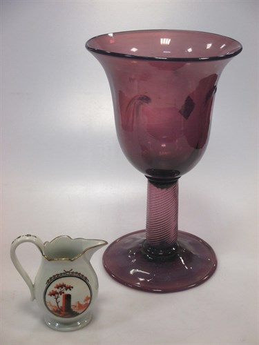 Lot 100 - An amethyst coloured vase with bud shape bowl,...