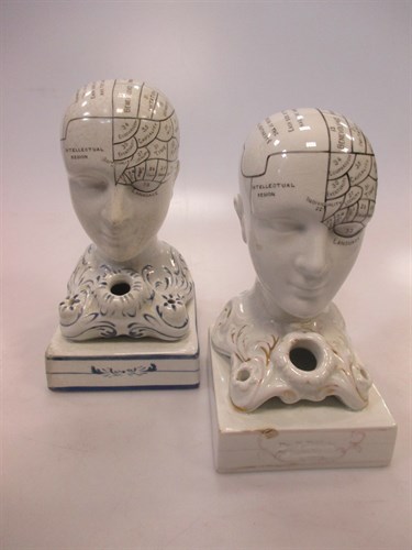 Lot 124 - Two ceramic phrenology head spill vases, one...