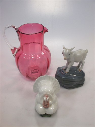 Lot 125 - A Royal Copenhagen lamb on a rock, a turkey,...