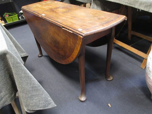 Lot 345 - An oval mahogany and inlaid drop leaf supper...