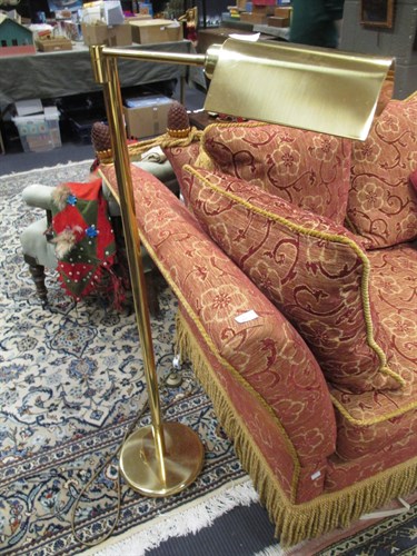 Lot 410 - A modern brass floor standing reading lamp