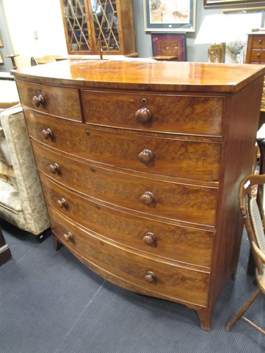 Lot 394 - A large Victorian mahogany bow front chest of...