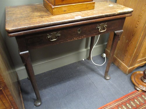 Lot 378 - A late 18th century oak two drawer side table,...