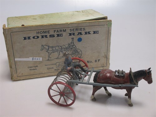 Lot 76 - A Britains horse rake No. 8F, boxed