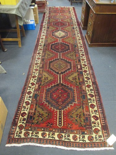 Lot 465 - An Azerbaijan runner, 4.50 x 1.07m