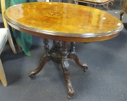 Lot 245 - A late Victorian inlaid walnut oval occasional...