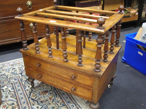 Lot 436 - A Victorian walnut Canterbury
