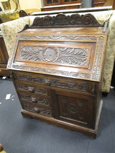 Lot 445 - A late Victorian carved oak bureau, 114 x 92 x...