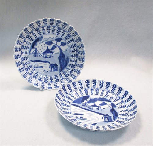 Lot 74 - A pair of Kangxi fluted dishes