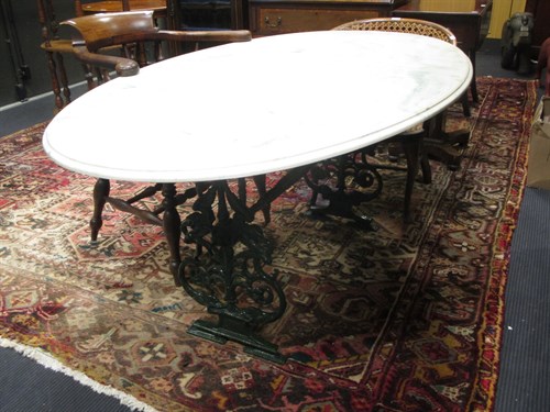 Lot 334 - A faux marble topped garden table on metal...