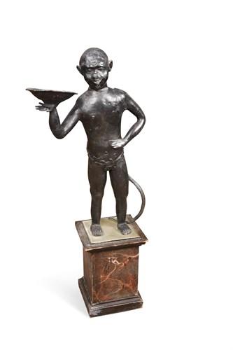 Lot 414 - A lead Fairground dumb waiter figure of a...