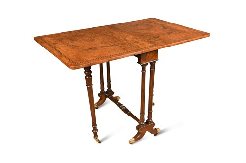 Lot 397 - A late Victorian figured walnut Sutherland table