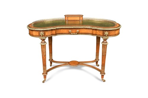 Lot 383 - A Louis XVI style walnut Kidney shape writing desk
