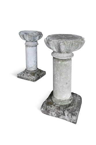 Lot 419 - A pair of weathered stone column pedestals