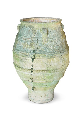 Lot 428 - A middle-eastern terracotta amphora vase