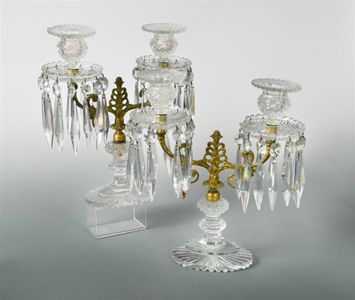 Lot 196 - A pair of 19th century cut glass and gilt metal twin-branch candle lustres