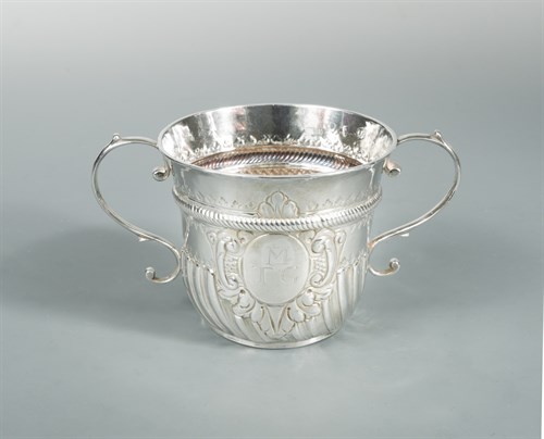 Lot 35 - A George II silver two handled porringer