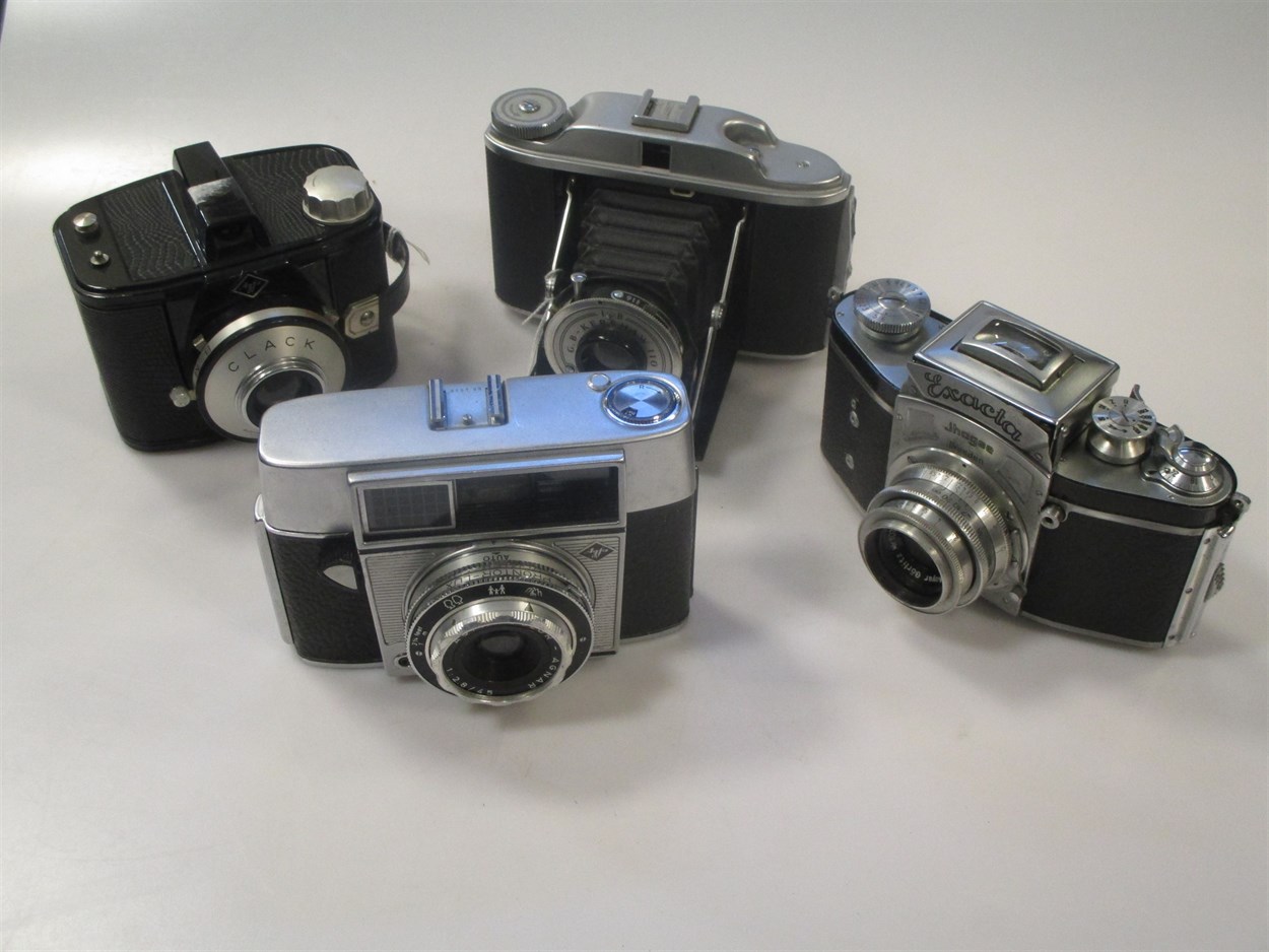 Lot 103 - An Exacta Jhagee SLR camera with case, a G B...