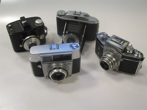Lot 174 - An Exacta Jhagee SLR camera with case, a G B...