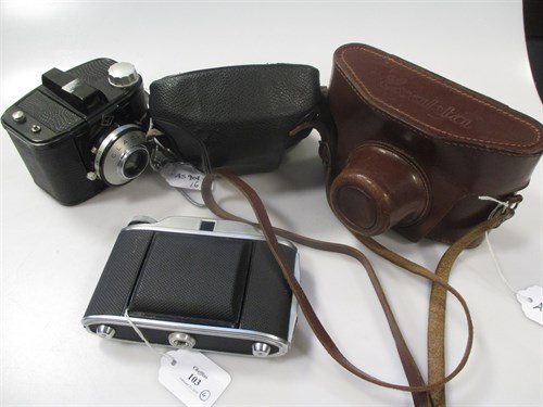Lot 103 - An Exacta Jhagee SLR camera with case, a G B...