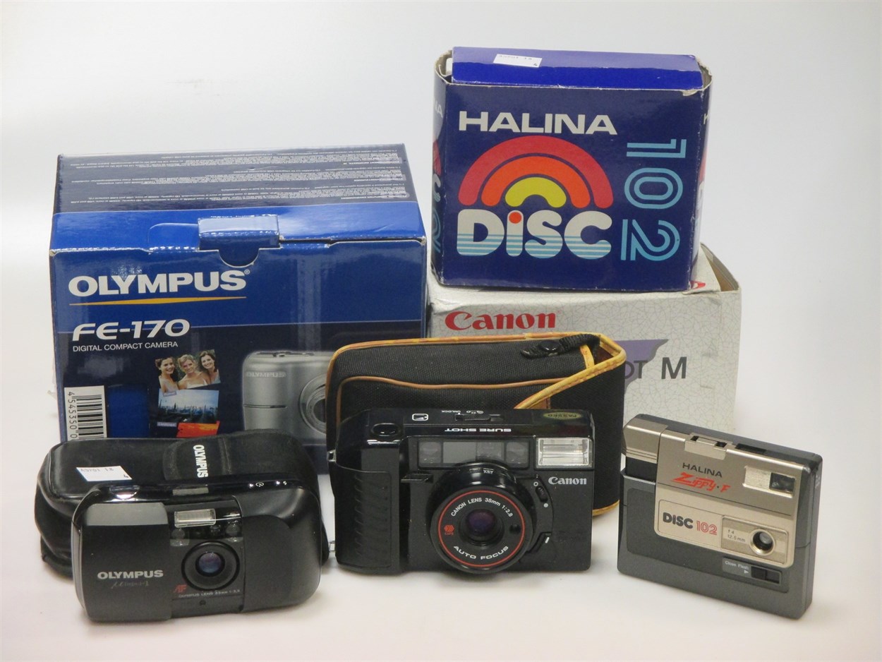 Lot 179 - A Halina 'Zippy F' Disc 102 camera, boxed, a...