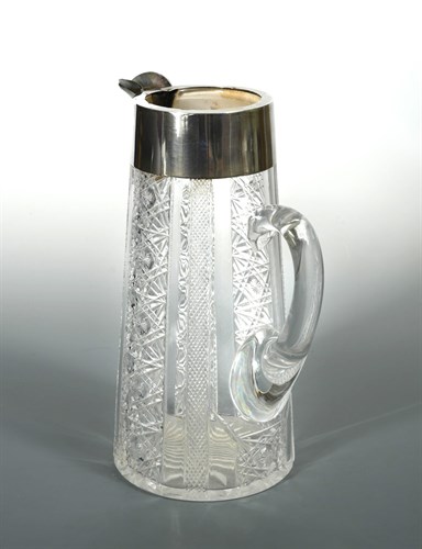 Lot 87 - A Victorian cut glass lemonade jug with silver...
