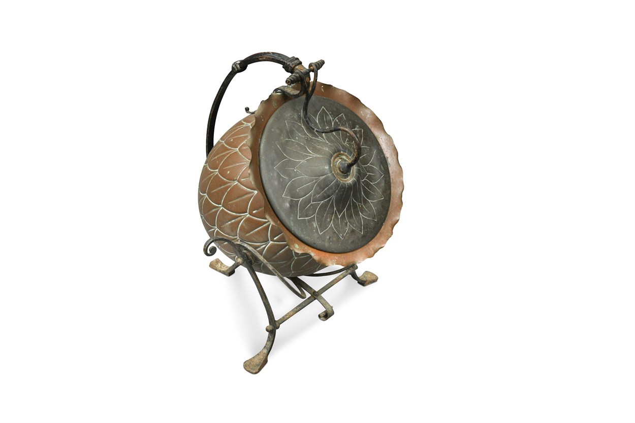 Lot 95 - Attributed to Christopher Dresser for Benham & Froud Ltd, a botanic copper coal scuttle