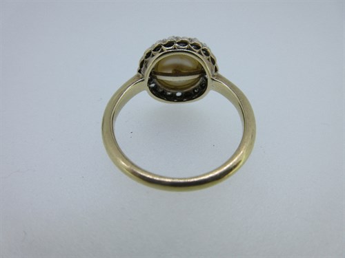 Lot 374 - A pearl and diamond ring together with a sapphire and pearl brooch