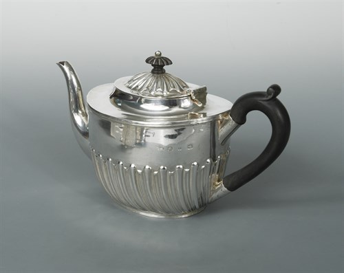 Lot 88 - A Victorian silver bachelor's tea pot