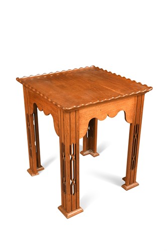 Lot 125 - An Art Nouveau style teak occasional table