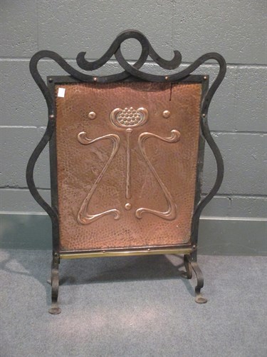 Lot 285 - Art Nouveau copper and wrought iron fire...