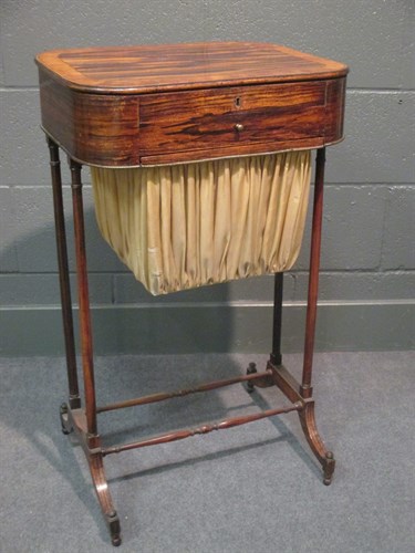 Lot 268 - A Regency coromandel sewing table