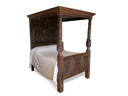 Lot 311 - A 16th century and later oak tester bed