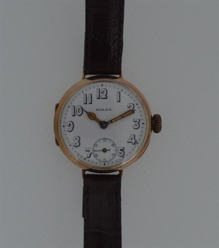 Lot 200 - Rolex - A 9ct gold WW1 officer's 'Trench' wristwatch
