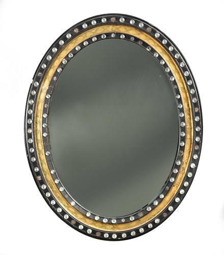 Lot 356 - An early 19th century Irish oval mirror