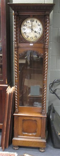 Lot 345 - An 8 day oak longcase clock with barley twist...