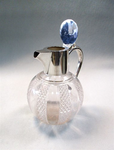Lot 90 - A Victorian silver mounted cut glass claret jug
