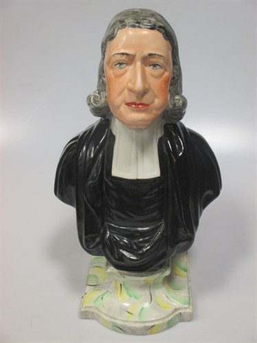 Lot 68 - A Staffordshire portrait bust of John Wesley,...