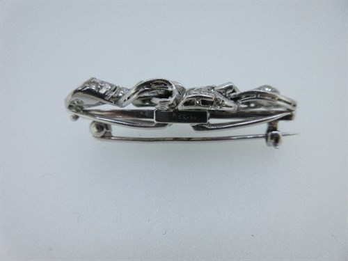 Lot 410 - A mid 20th century diamond double clip brooch