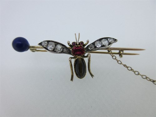 Lot 424 - A Victorian diamond and gem set insect brooch