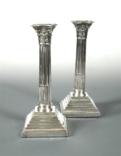 Lot 98 - A pair of Edward VII silver candlesticks