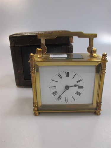Lot 104 - A cased brass French carriage timepiece, later...