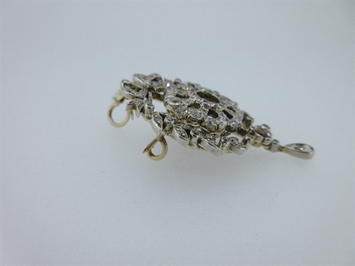Lot 396 - A Belle Époque diamond pendant / brooch