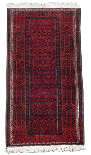 Lot 439 - A Beluchi rug