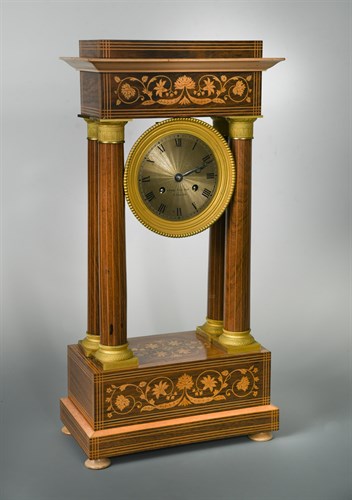 Lot 289 - A 19th century French portico mantel clock