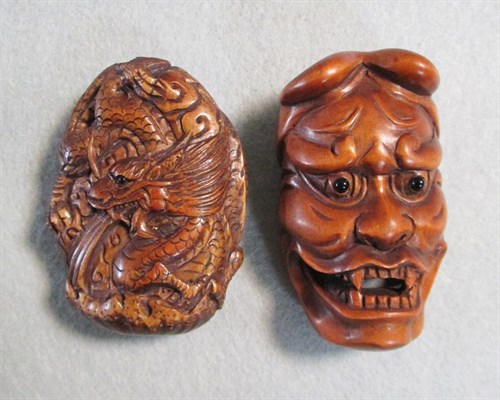 Lot 166 - A collection of 30 wooden netsuke, ojime and okimono, 20th century