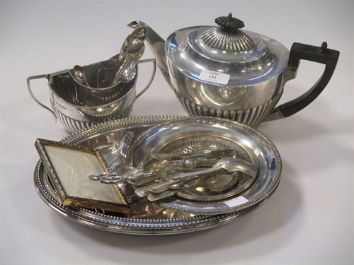 Lot 152 - A silver three piece tea set and a small...
