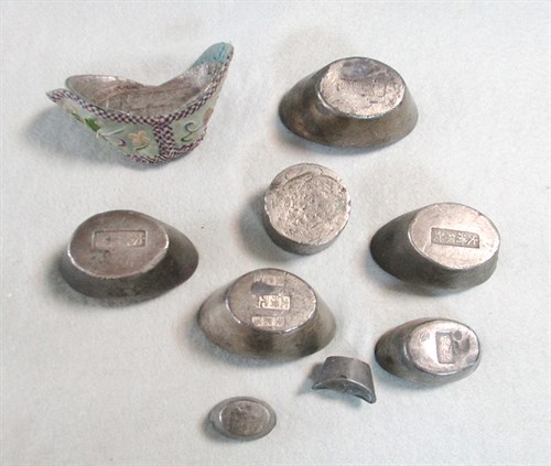 Lot 98 - A group of eight Chinese sychee white metal money ingots, Qing Dynasty and later