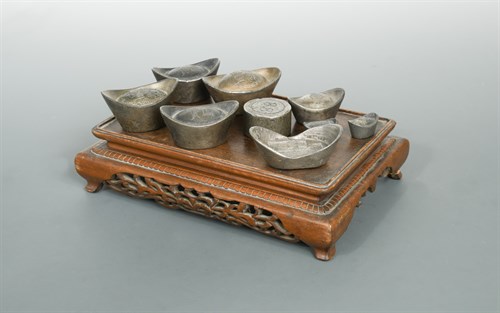 Lot 98 - A group of eight Chinese sychee white metal money ingots, Qing Dynasty and later