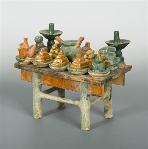 Lot 59 - A Ming dynasty sancai glazed offering table